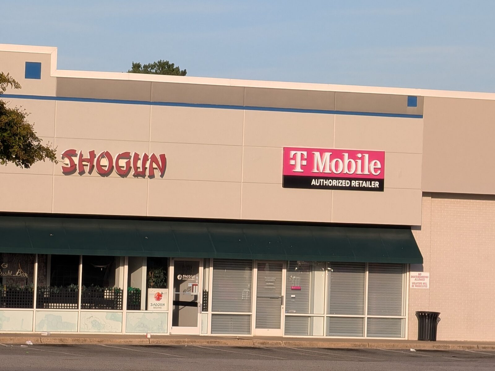 Commercial storefront exterior repaint after